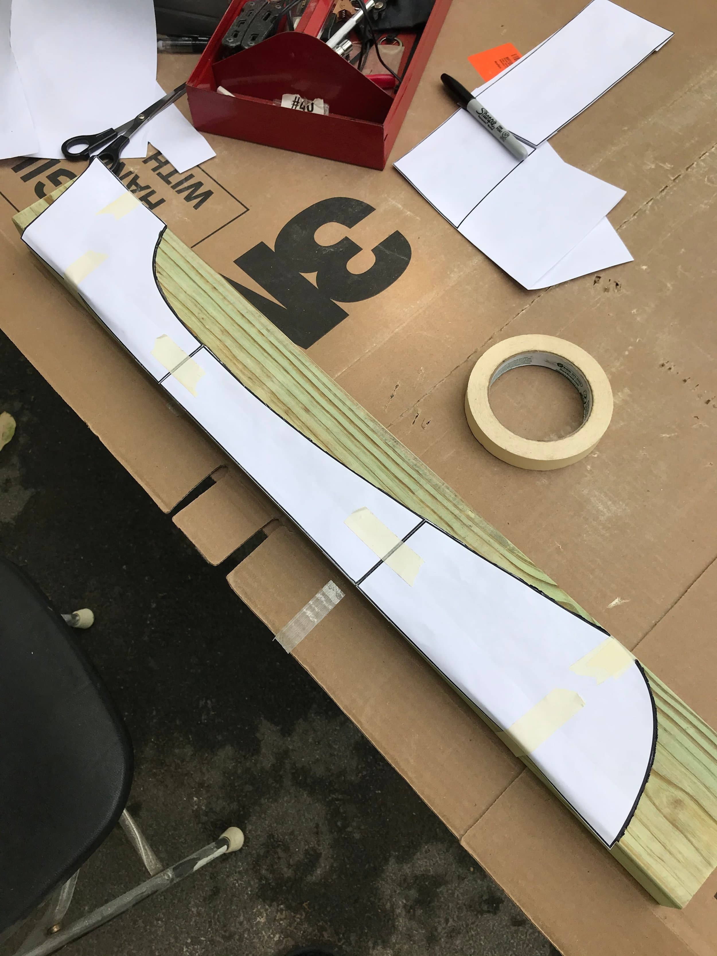 I taped the template to the wood and outlined it. I had no idea what I was doing when I started, but you can see how in small steps it seems simple enough.