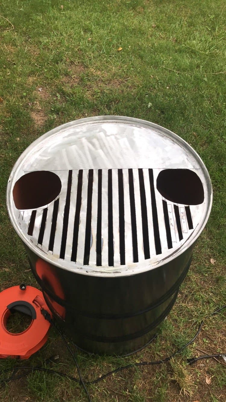 Using an angle grinder and a dremel, I cut out the pattern.