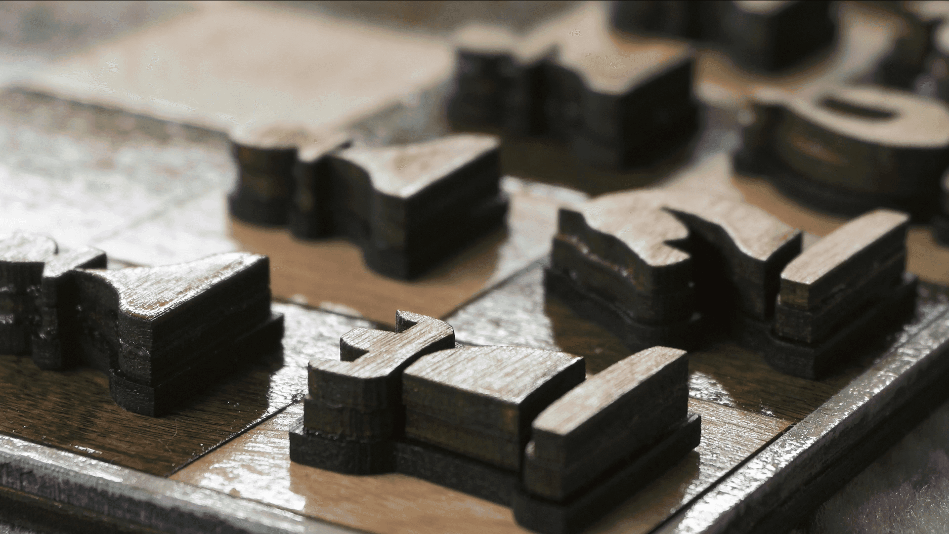 A closeup of the chess board. Each chess piece was made of multiple layers/sections. It was a tedious process but a beautiful result.