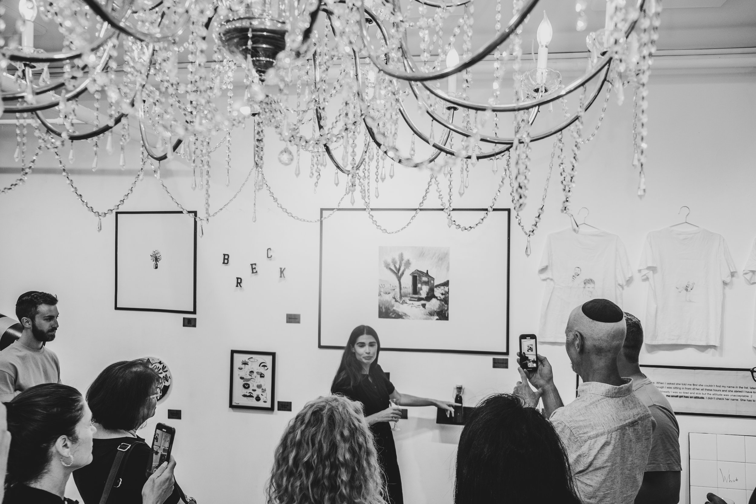 My favorite part: after I proposed, our families came by and Nicole gave them a tour of the gallery.