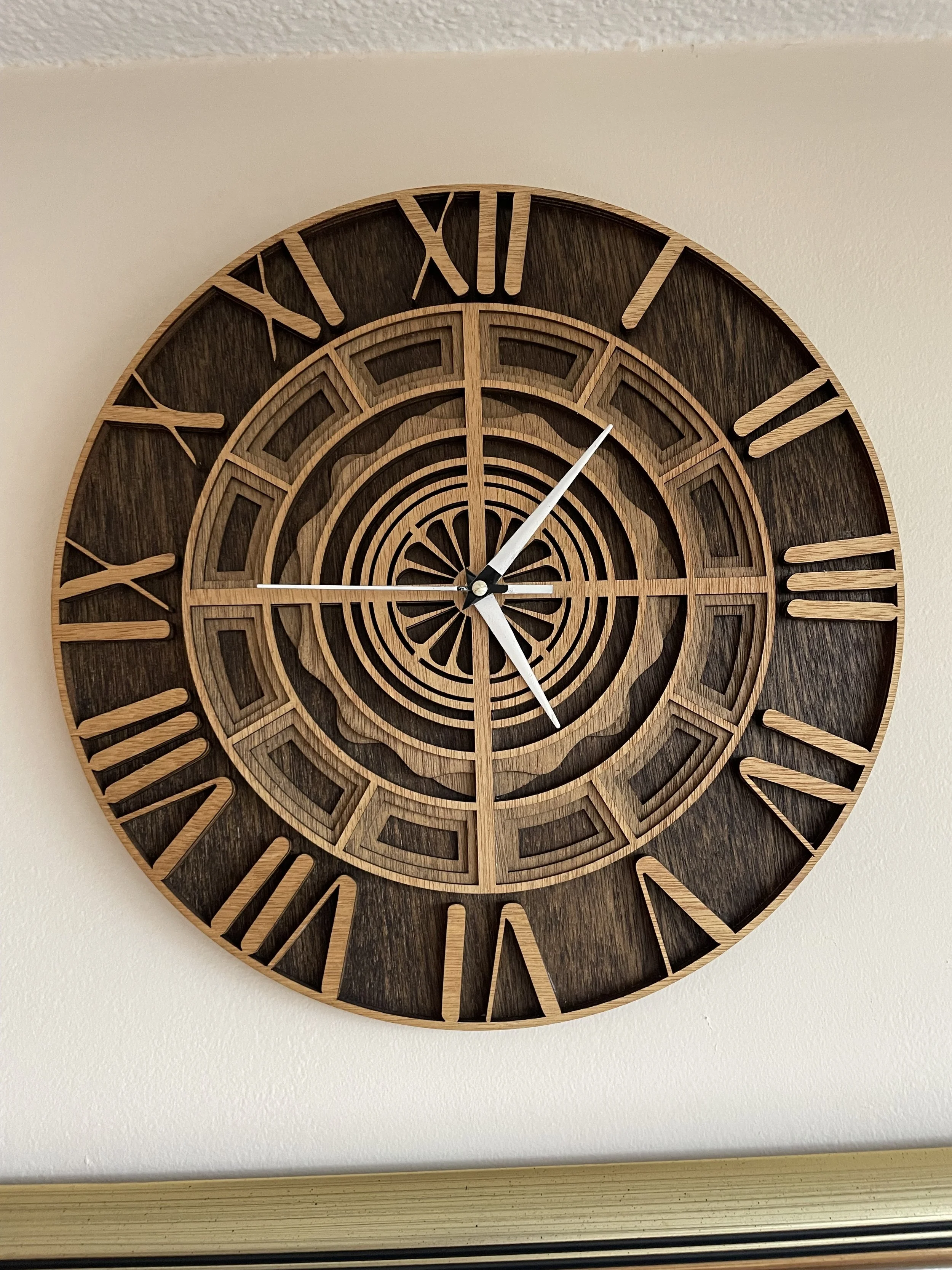 The clock as it hangs now on my grandmother's wall. The joy for me was in making, and I would come hang them for any family or friend who wanted it.