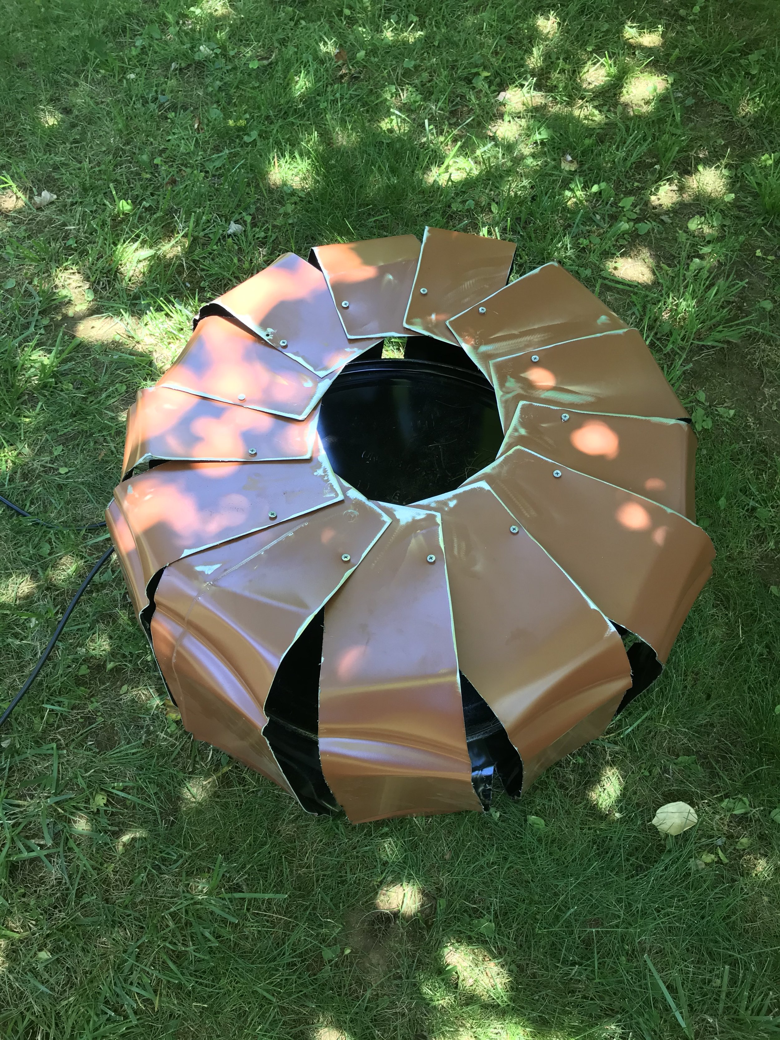 I then overlapped each section and fastened them together, and smoothed the edges with the angle grinder.