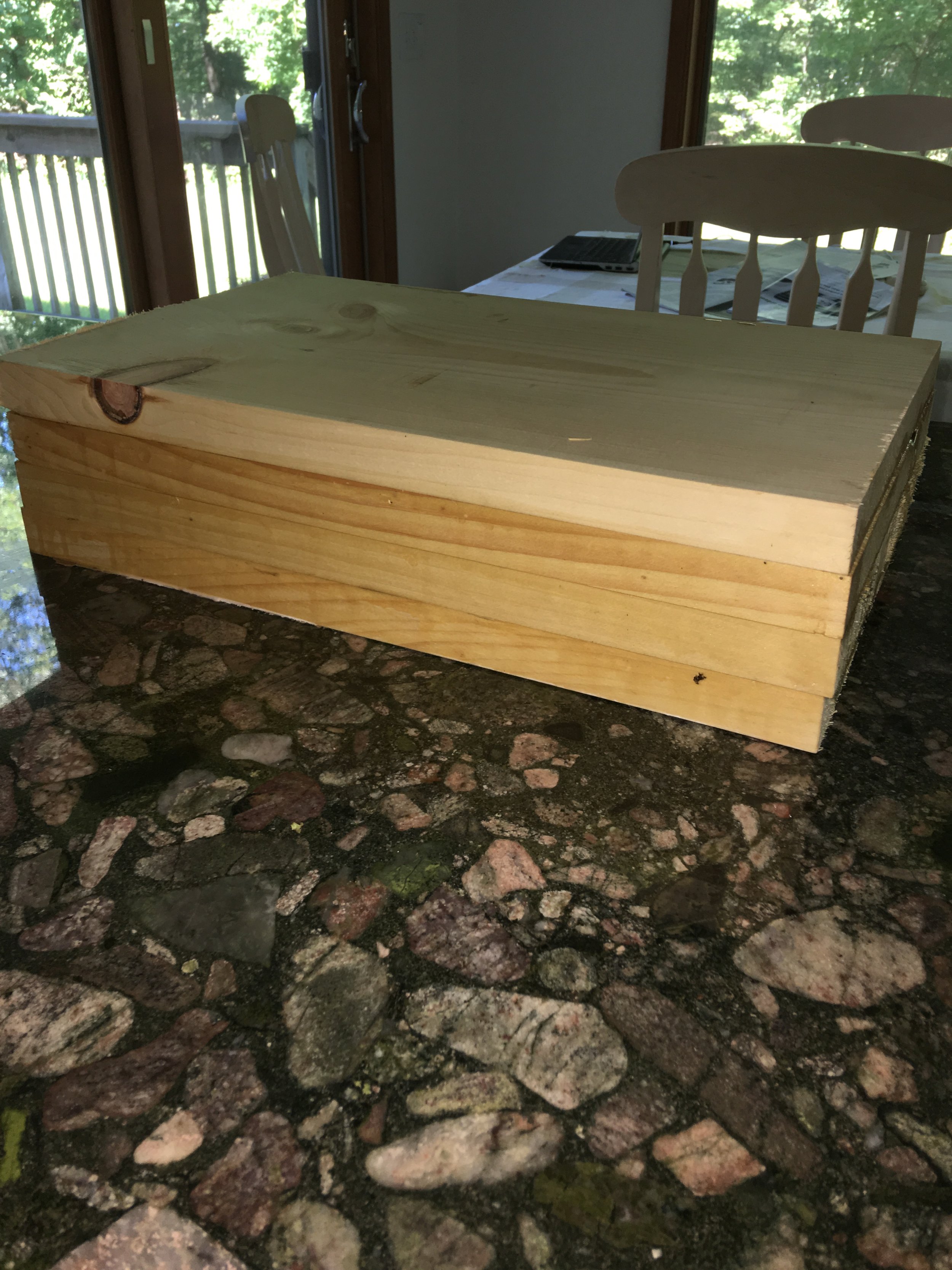 I glued some slabs of wood together and sketched out some guide marks.